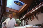 Master stained glass restorer Claude Barre in his Amiens atelier, Somme. (74kb)