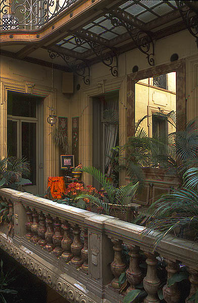 The home is constructed on four levels around a central atrium, beneath wrought-iron glazing panels by Gutave Eiffel.
